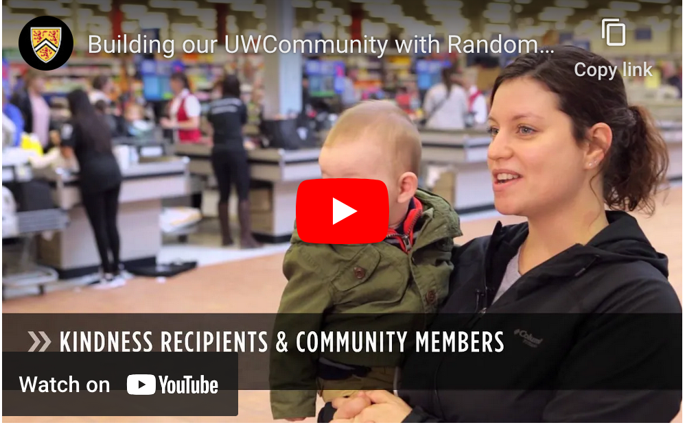 A screenshot from a YouTube video about Random Act of Kindness Day.