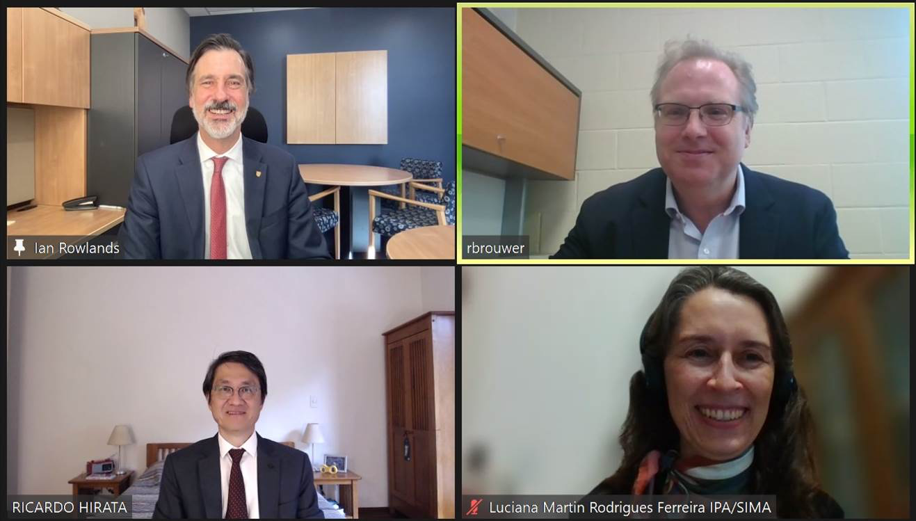 Four participants in a digital video call.