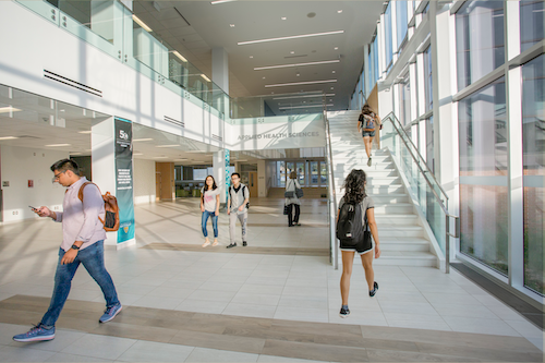 Students walk through the new BMH expansion.