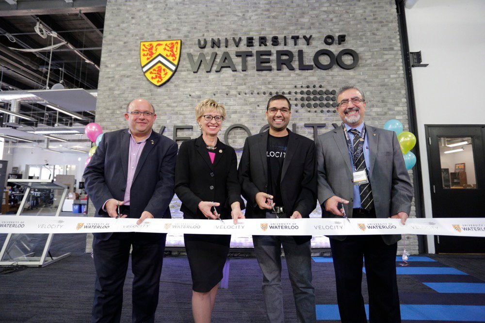 Berry Vrbanovic, Daiene Vernile, Jay Shah, and Feridun Hamdullahpur cut the ribbon at Velocity Garage. 