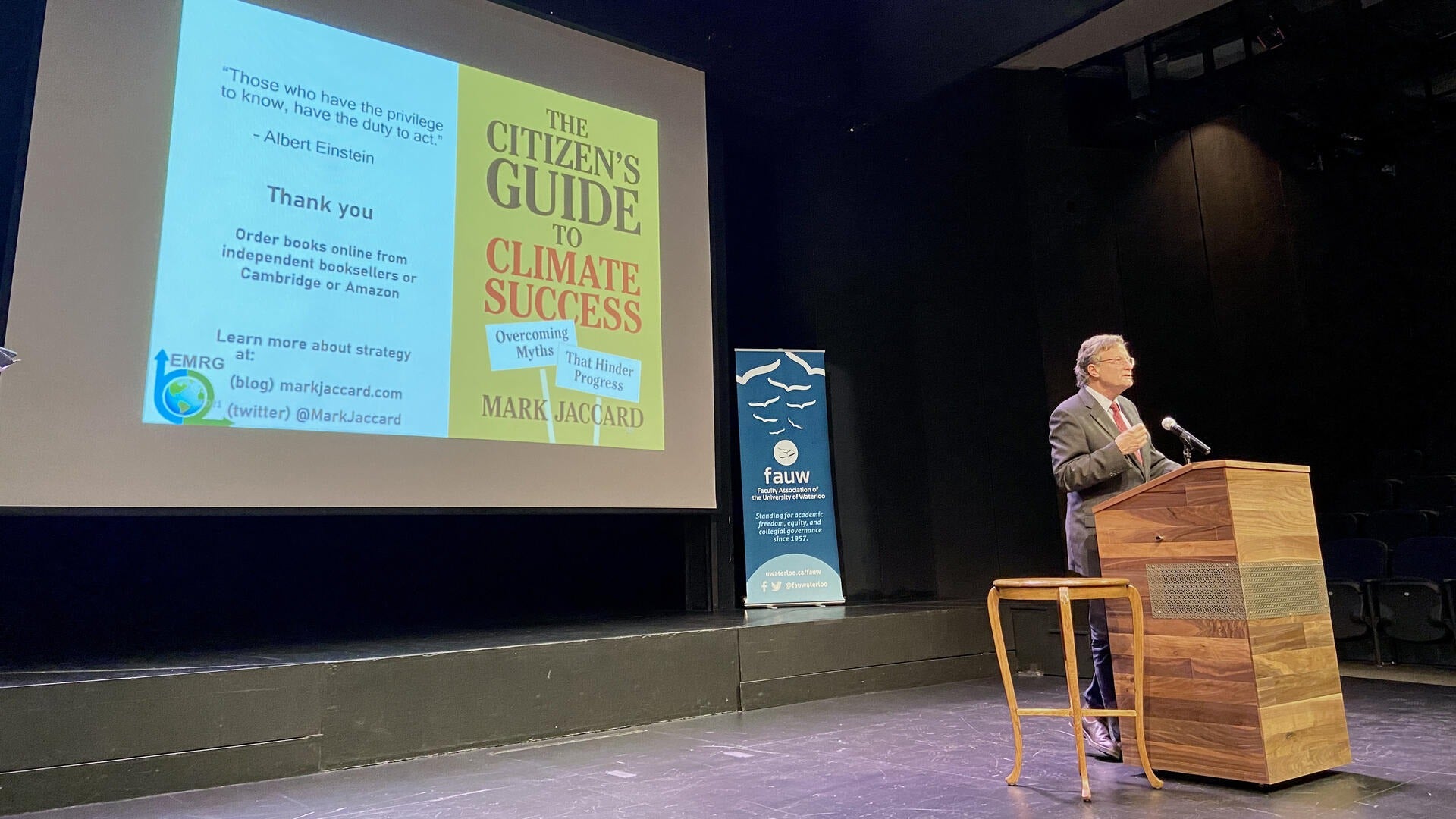 Mark Jaccard speaks on stage during the Hagey Lecture.