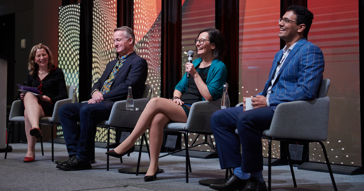 Dean Mary Wells on stage with other speakers at the Tech Horizons forum.