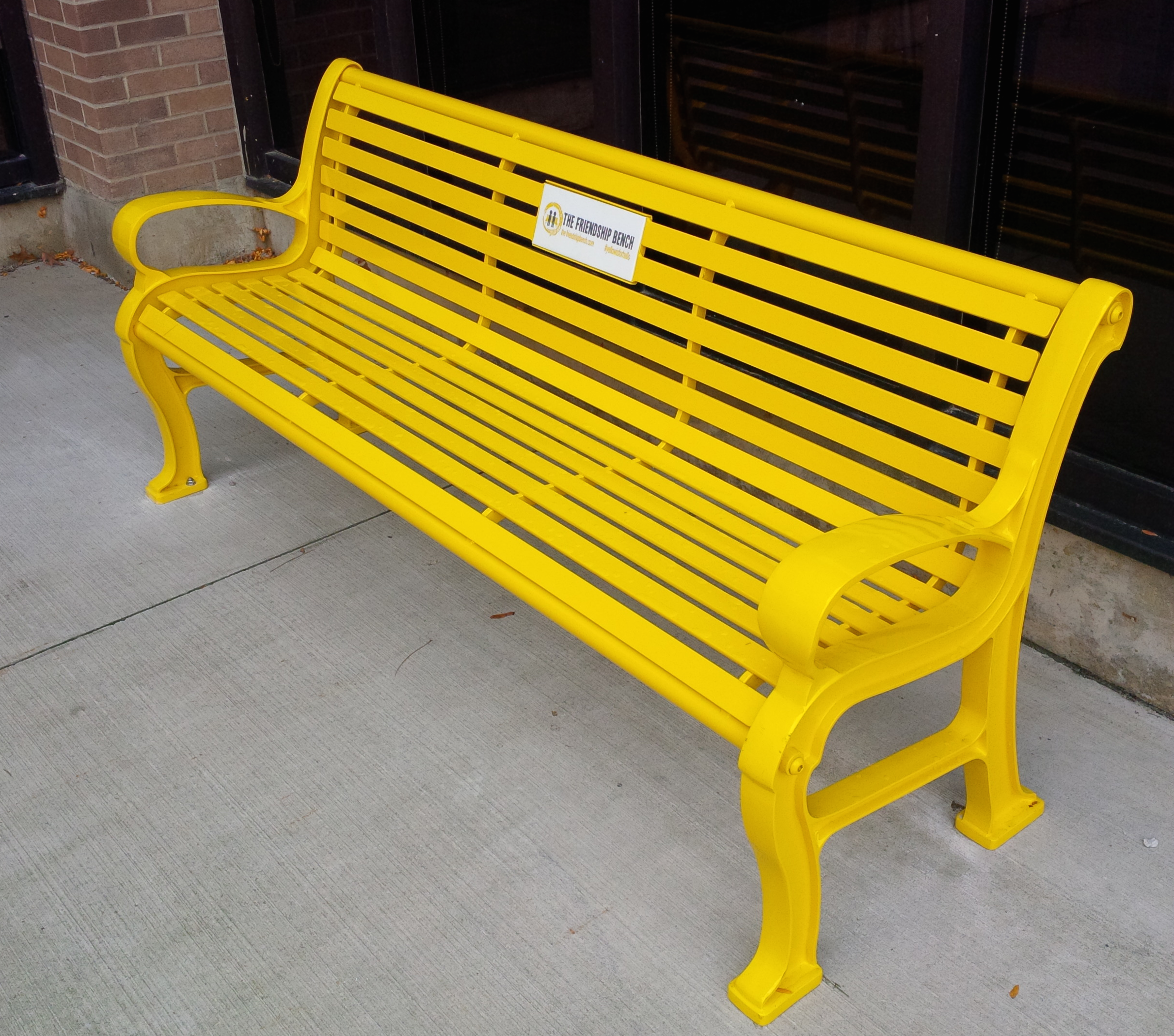 The yellow Friendship Bench in the CPH courtyard.