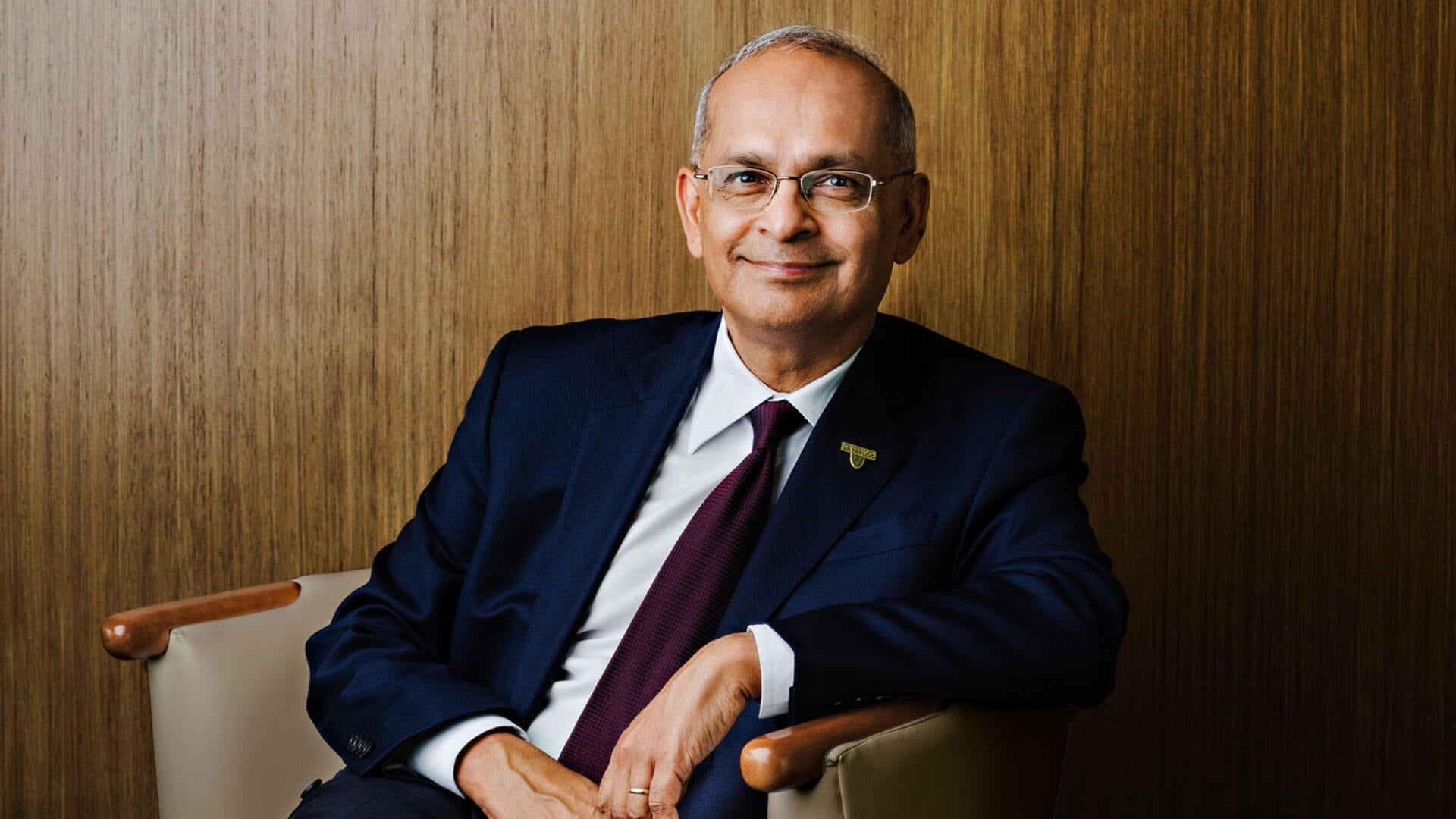 President Vivek Goel seated in a chair.