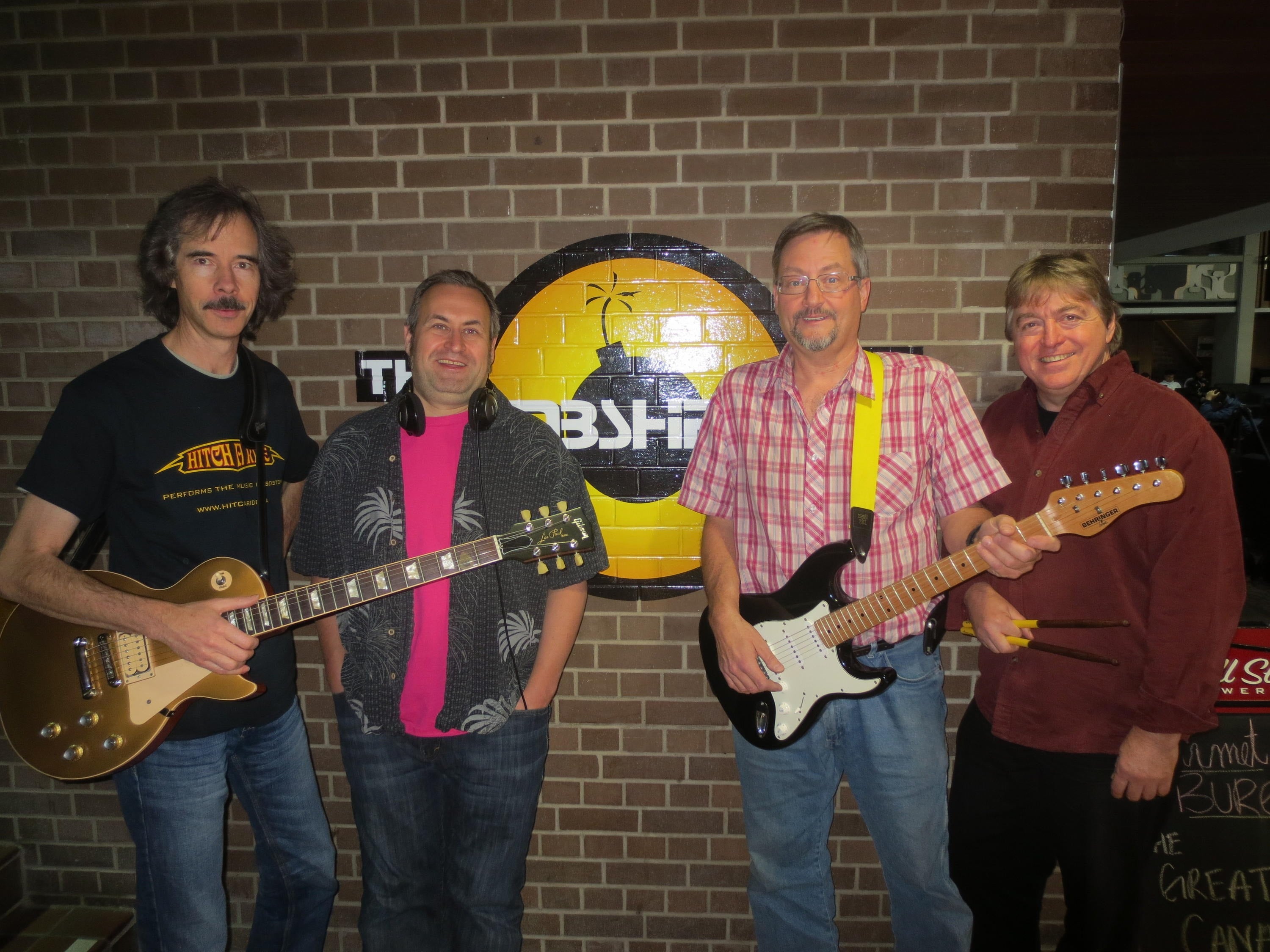 Robyn Landers, Dave Tompkins, Dan Hergott, and Lawrence Folland are ready to rock at The Bombshelter.