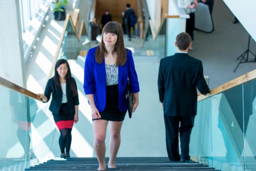 Students on the steps in the Tatham Centre.