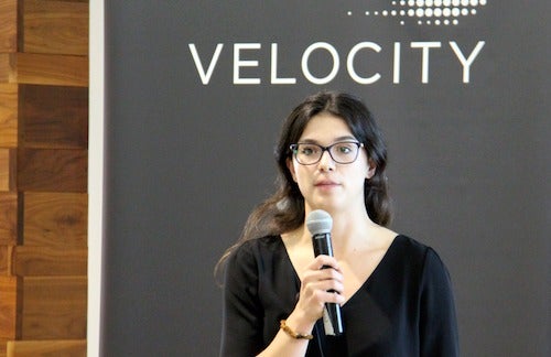 A student presents at a Velocity finals event.