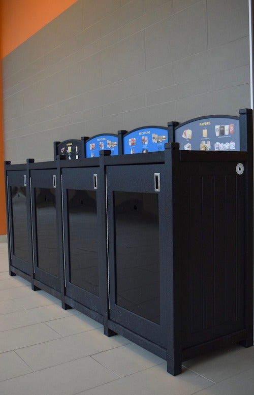 A bank of standardized waste receptacles.