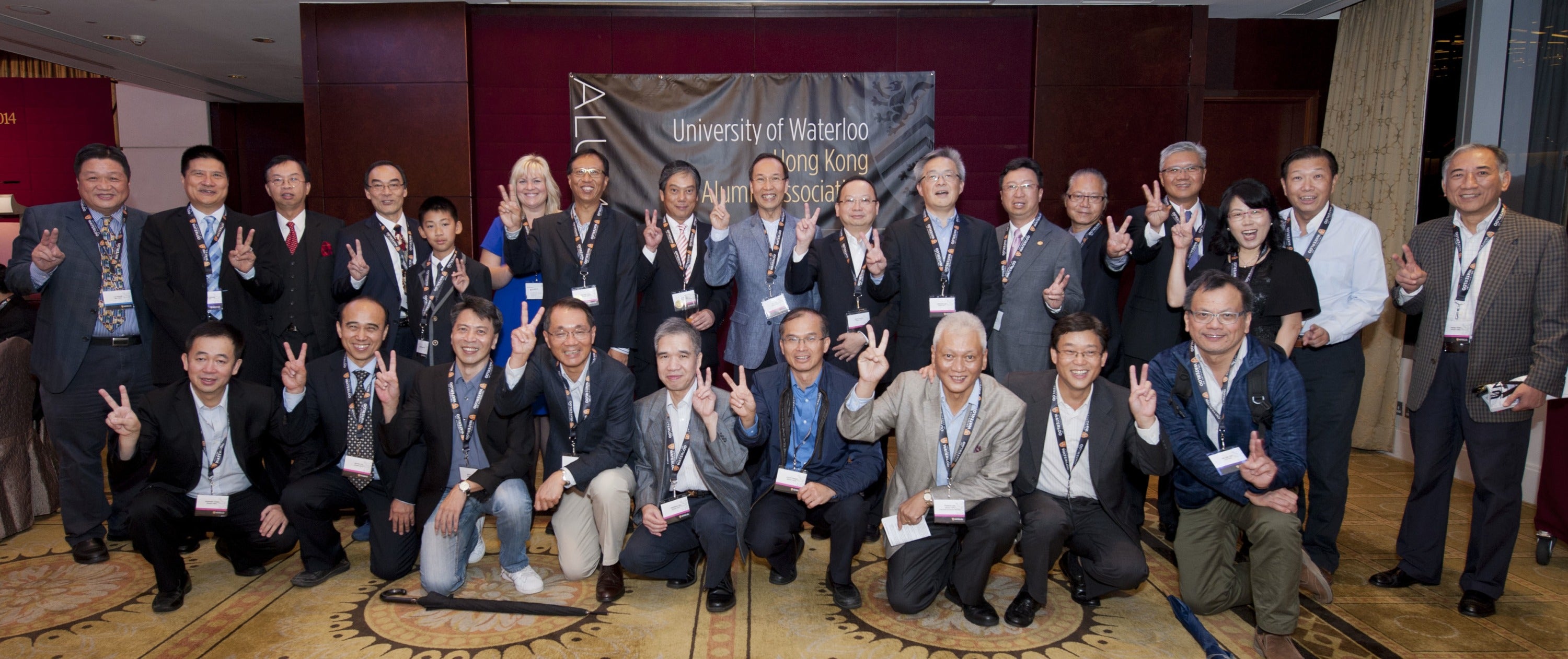Members of the Hong Kong Alumni Association pose in the office.