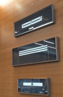 The three wampum belts installed in the Board and Senate Room.