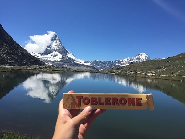 The Matterhorn with a Toblerone bar held up for comparison.