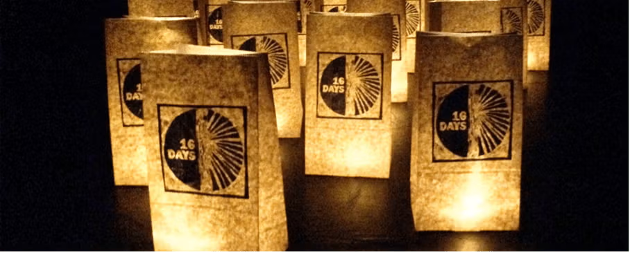 Paper lanterns with the 16 Days of Activism logo printed on the paper.
