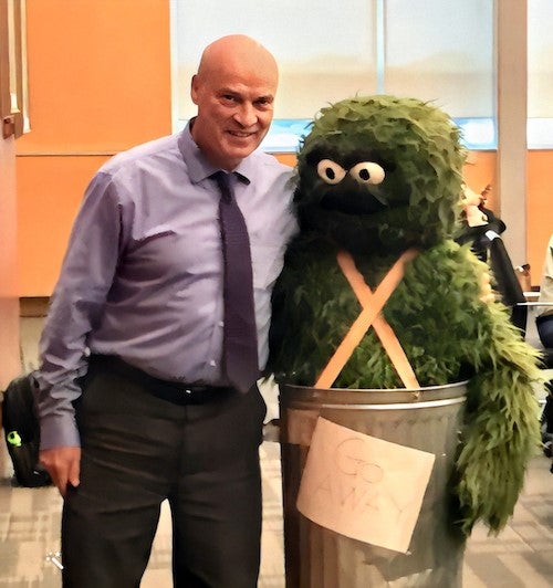 Dennis Huber with a costumed Dean of Engineering Pearl Sullivan.