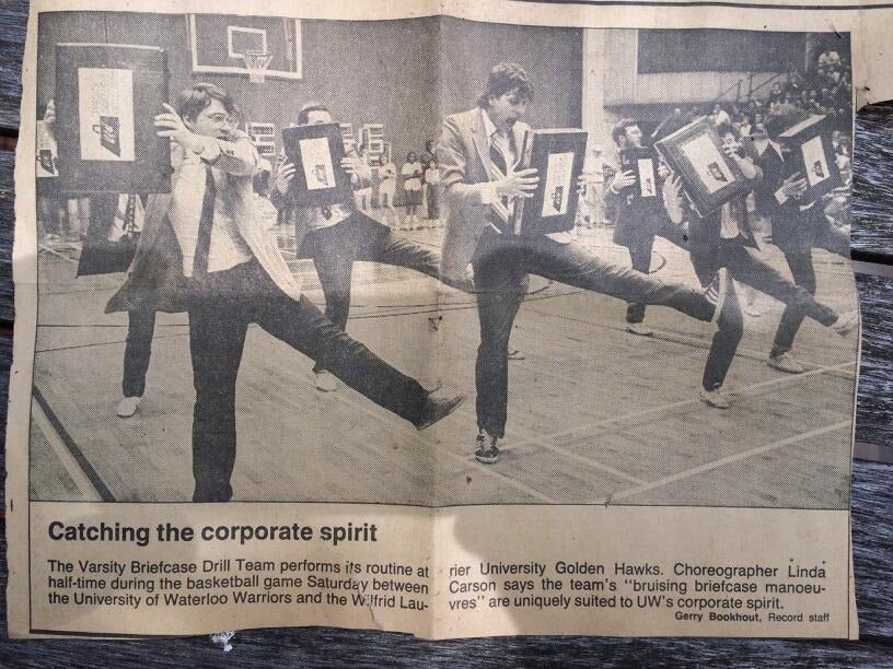 The Varsity Briefcase Drill Team performs at a Warriors game.