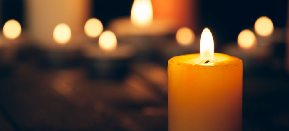Candles lit in memoriam.