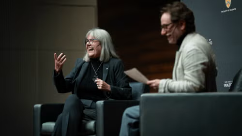 Dr. Donna Strickland laughs while seated on stage with an interviewer.