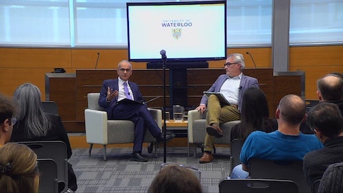 Vivek Goel and Jim Rush at the town hall.