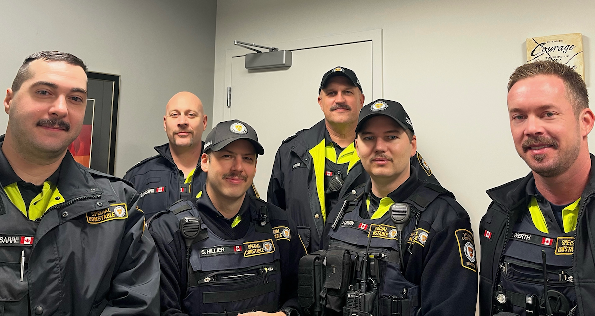 Six members of the Special Constable Service sporting moustaches.