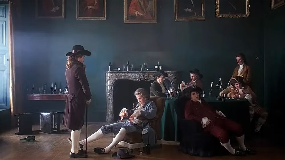 A still from the Stanley Kubrick movie "Barry Lyndon" - men idly sitting and playing cards.