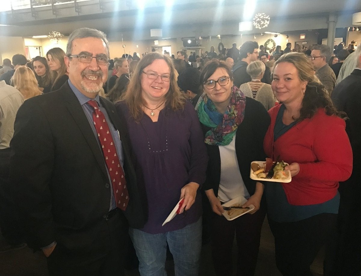 Feridun Hamdullahpur with Waterloo staff at the Holiday Luncheon.