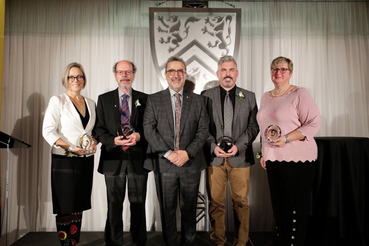 President Feridun Hamdullahpur with the 2018 PCIA award winners.