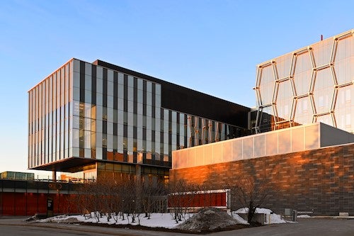 The Quantum Nano Centre at sunset in a wintry scene.