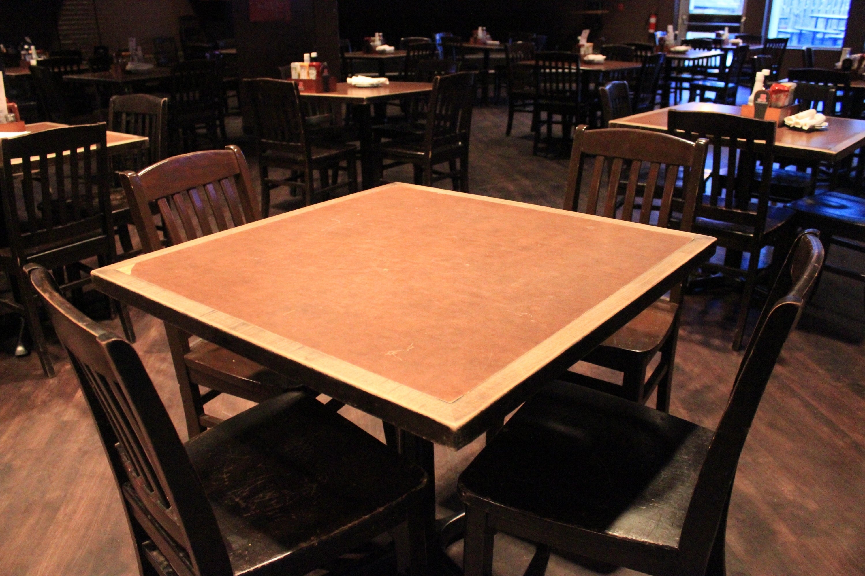 Tables and chairs in the Bombshelter Pub.