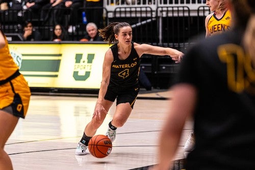 Vanessa Hughes on the basketball court.