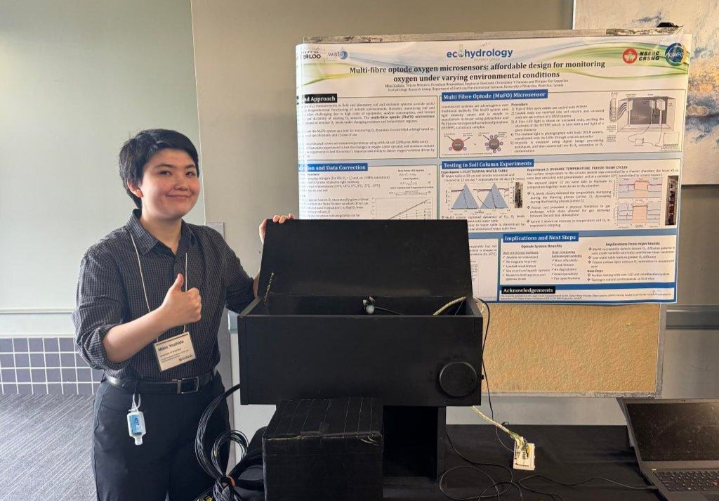 Miles Yoshida presenting their research