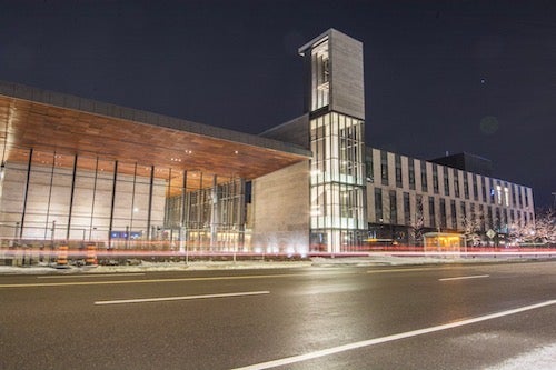 The Balsillie School CIGI Campus building at night.