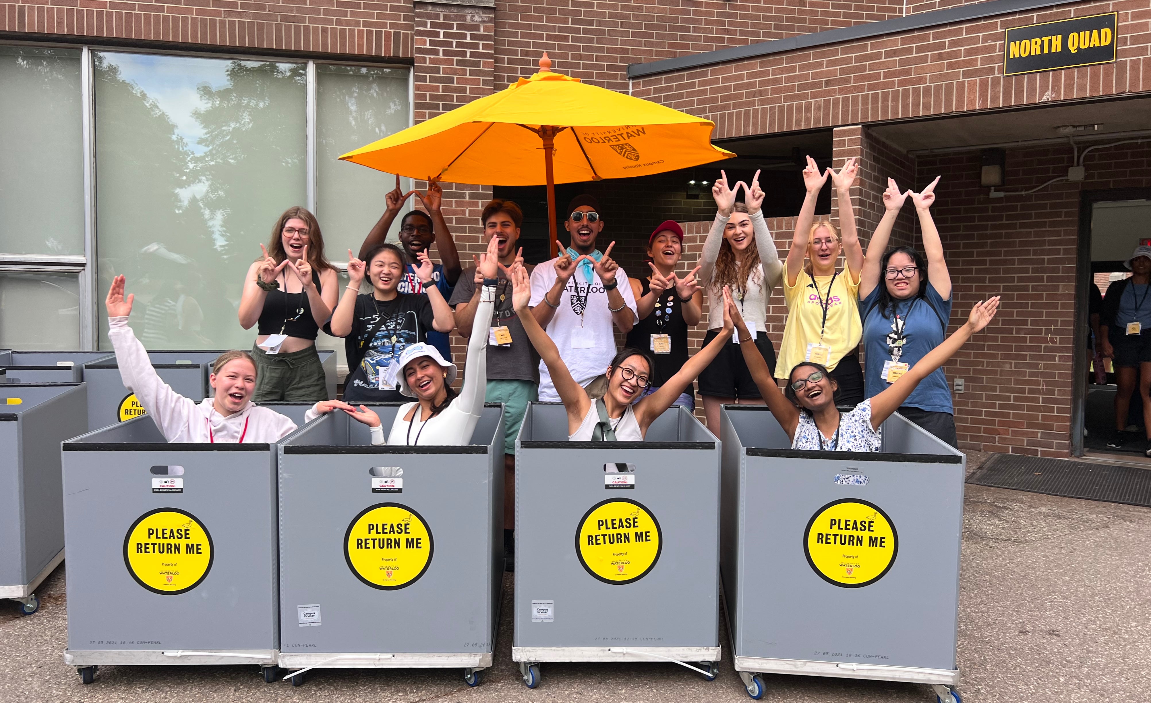 Volunteers for student move-in with carts
