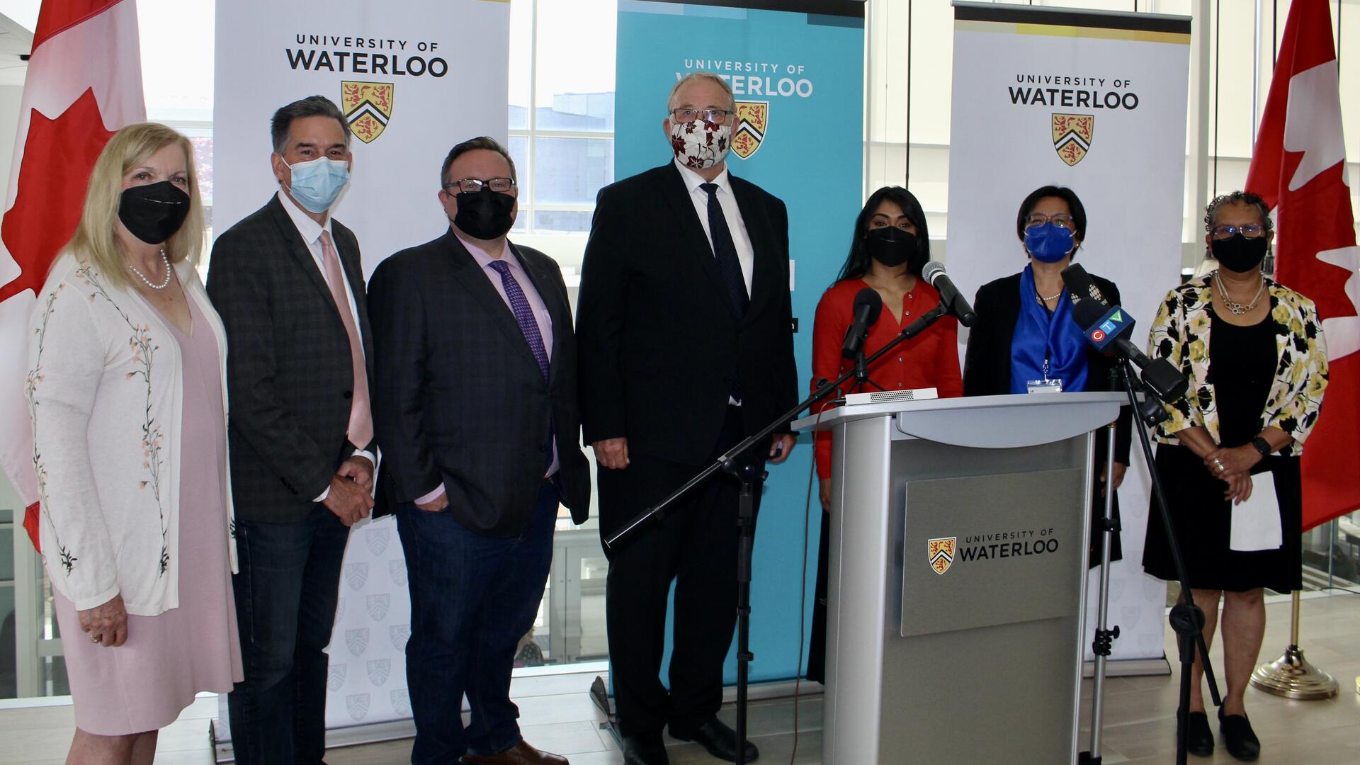 VIPs at the Waterloo podium during a funding announcement for dementia search-and-rescue initiative