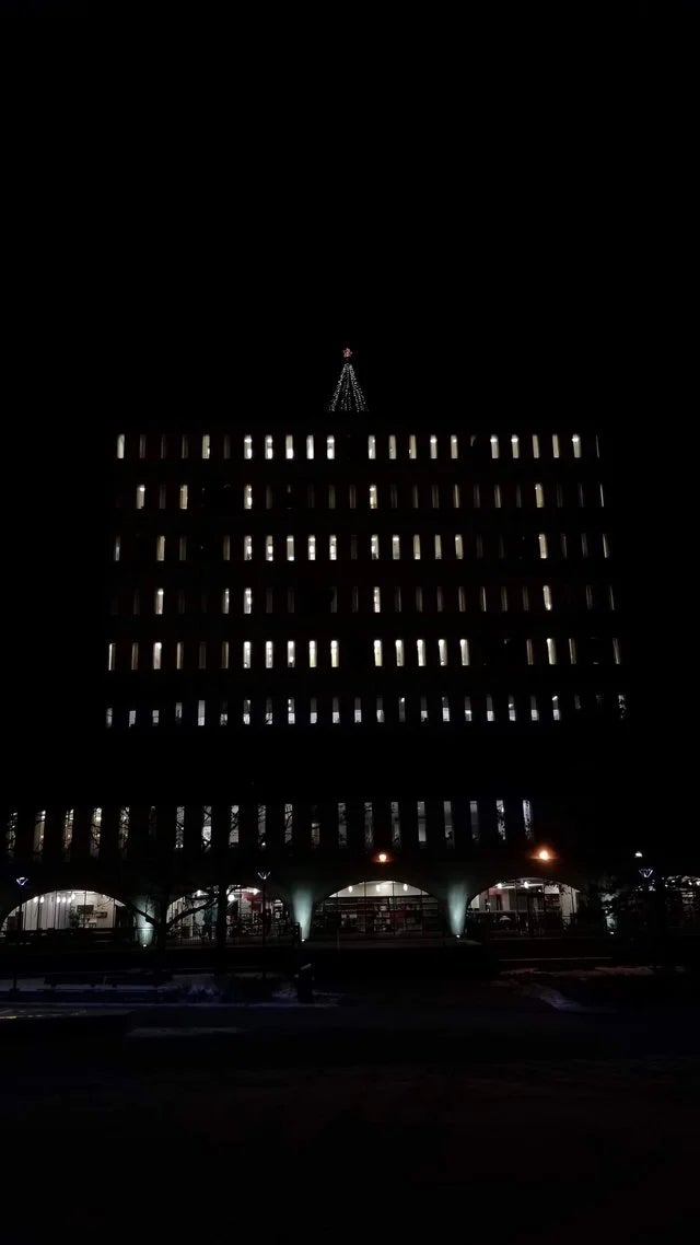 The windows of the Dana Porter Library covered up to spell "YEET"