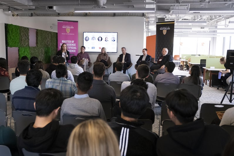 event photo featuring students and panelists