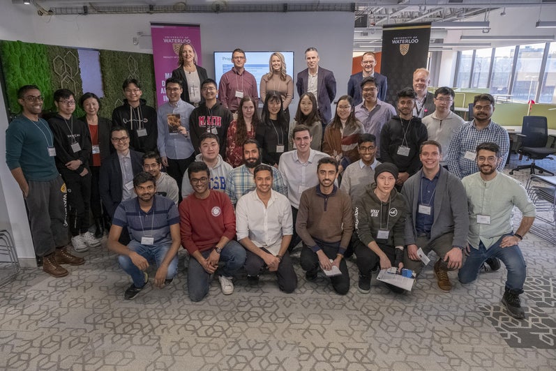 Group photo of students and industry panelists