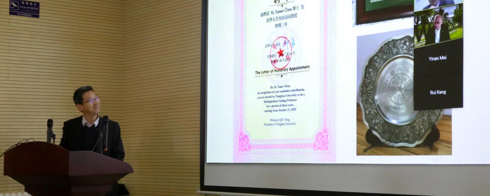 photo of virtual ceremony where Tamer Ozso named Distinguished Visiting Professor
