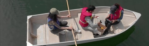 Students test radiometer in boat