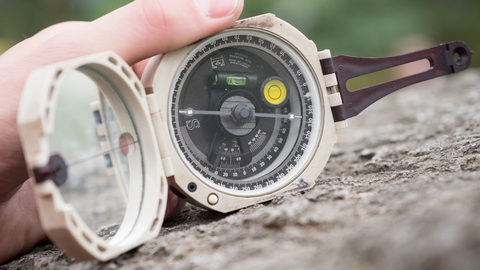 Compass on a rock. 