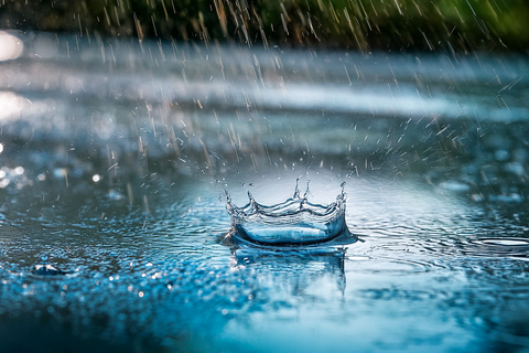 Raindrop hitting a puddle.