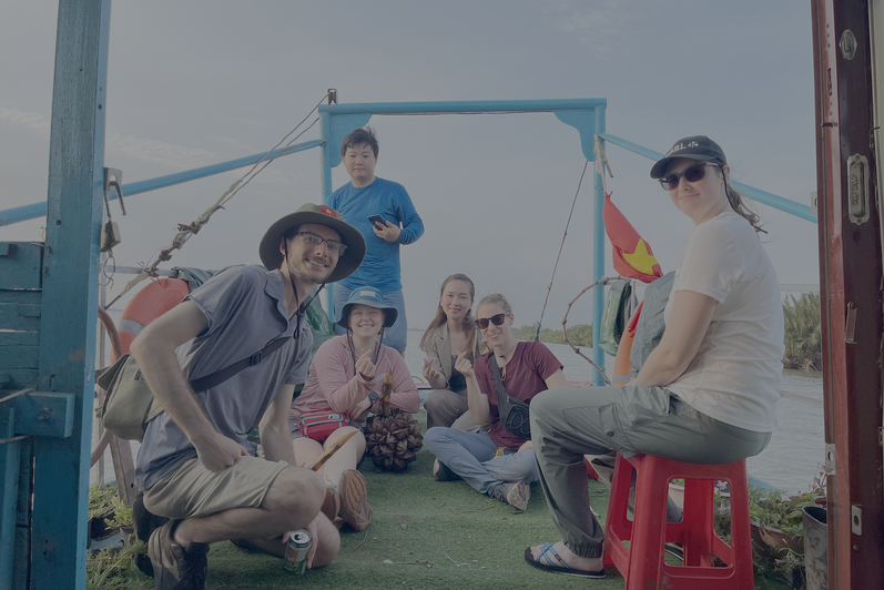 Students on a boat in Vietnam. 
