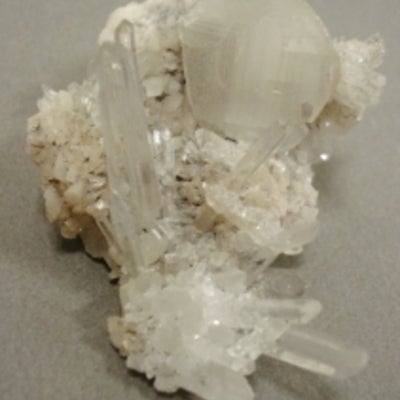 Calcite and Quartz on Dolomite; white crystal