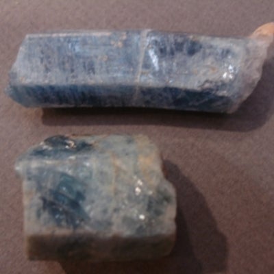 side view of 2 Blue Beryl crystals