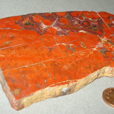 Mexican Quartz Geodes next to a penny for size comparison