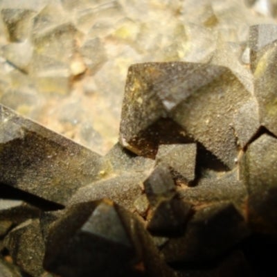 Close-up of epidote crystals allowing for more evident geometic recognition 