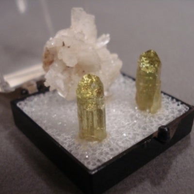 Pectolite and Vesuvianite; seperate white and gold crystals