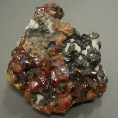 Sphalerite; mostly red and black in colour