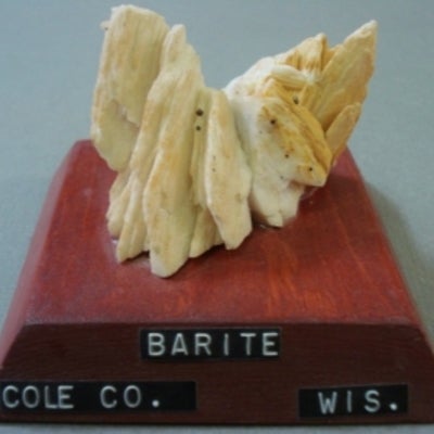 Baryte mounted on a wood base with a label