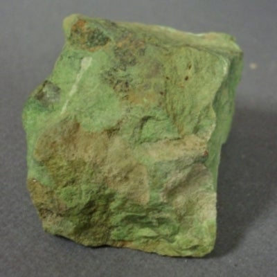 Piece of bright green mineral