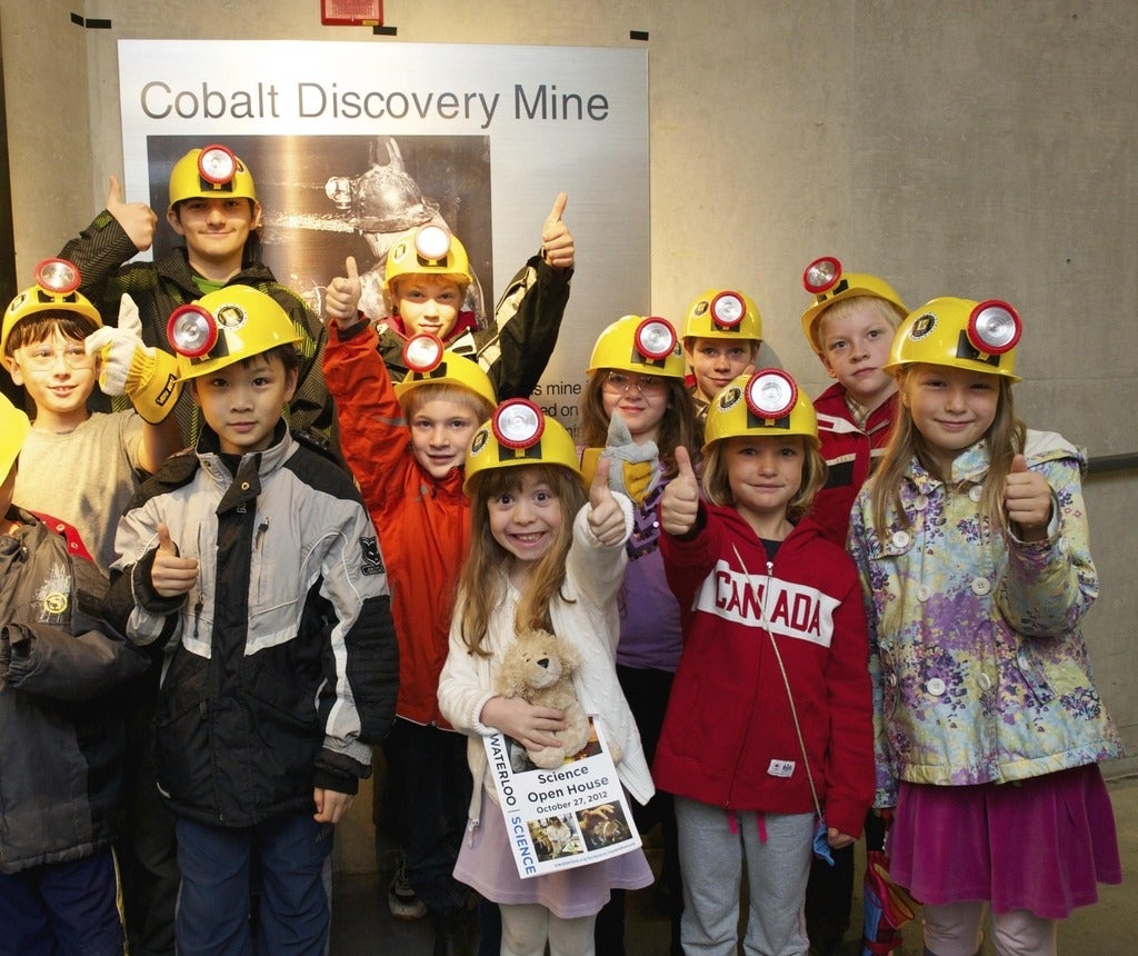 Class of children outside the mining tunnel