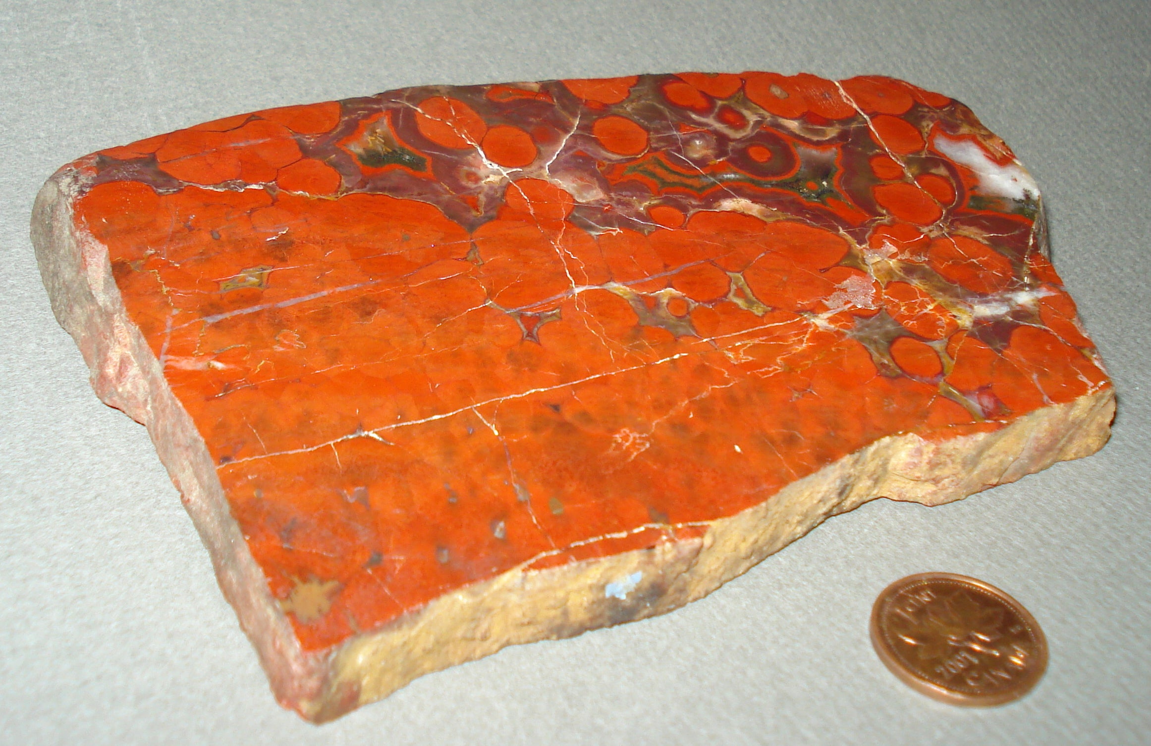 Mexican Quartz Geodes next to a penny for size comparison